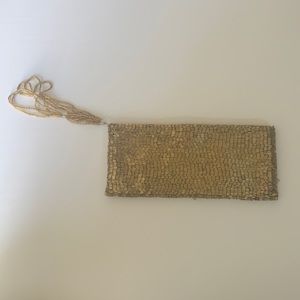 BEBE gold wristlet